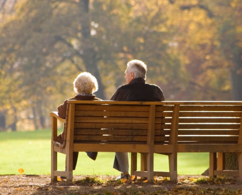 Seniors sitting on a bench